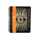 Notebook with eye design and an orange belly band label on black background
